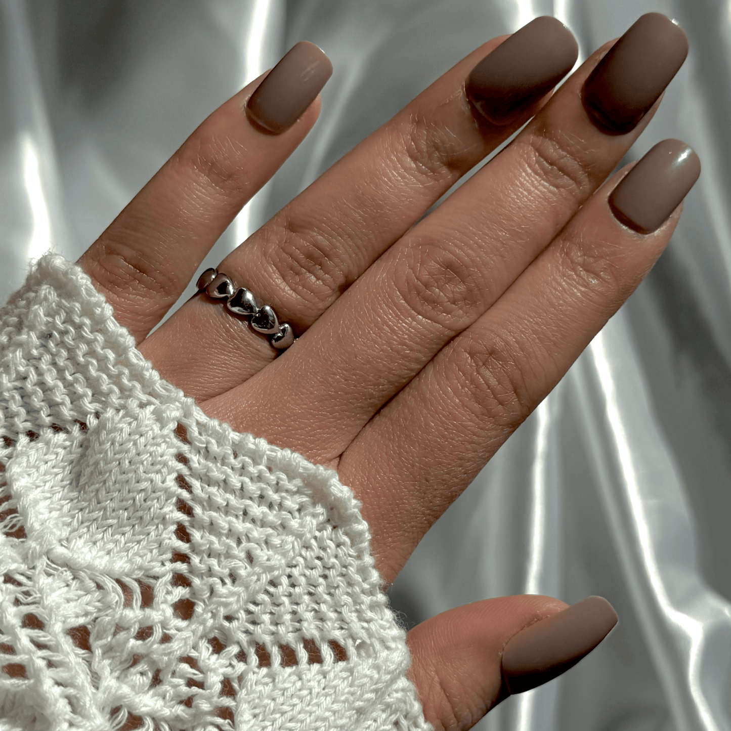 Bague en acier inoxydable argentée motif cœur ajustable