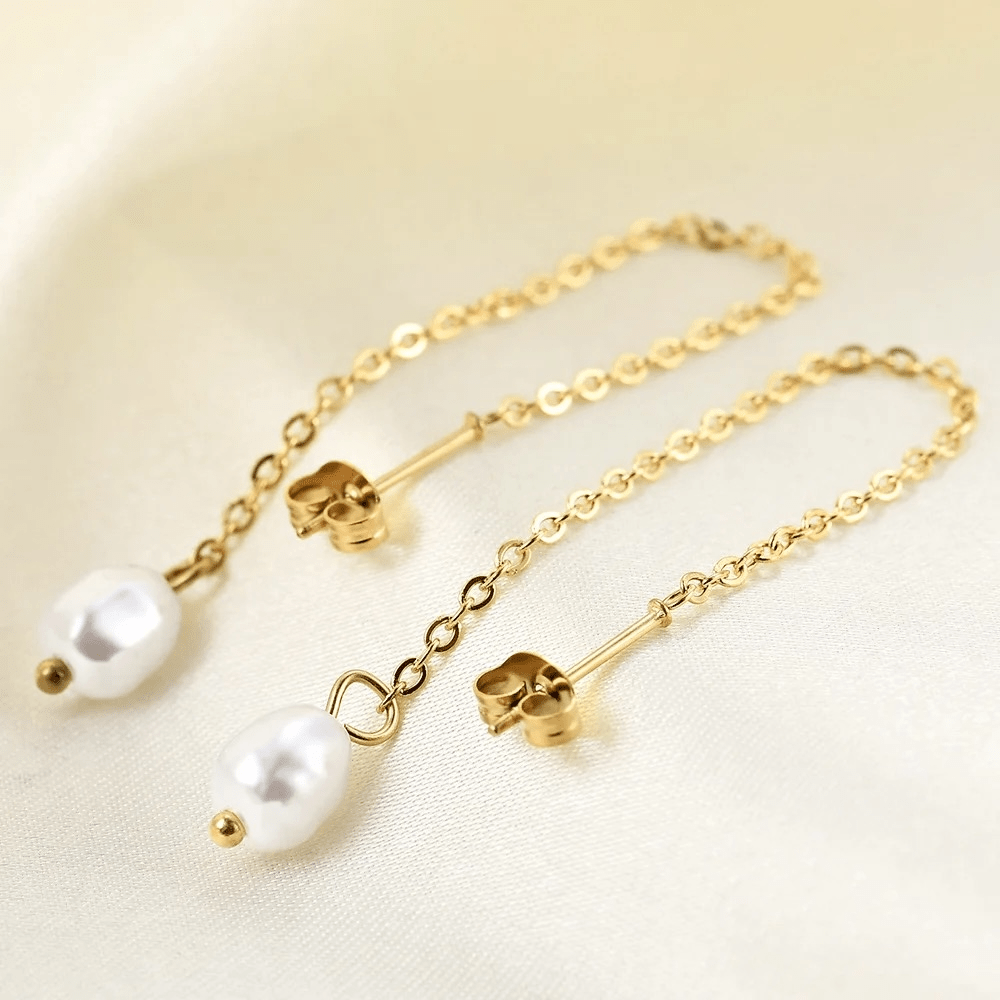 Boucles d’oreilles en acier inoxydable et perles blanches pas cher