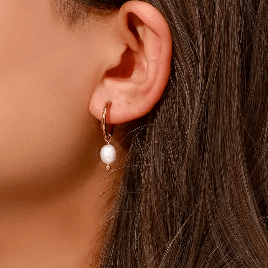 Boucles d’oreilles en acier inoxydable et perle blanche pas cher