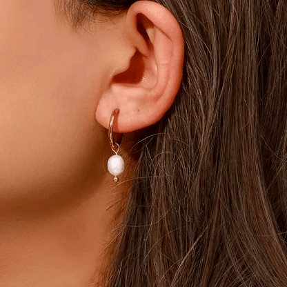 Boucles d’oreilles en acier inoxydable et perle blanche pas cher 