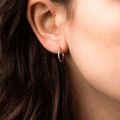 Mono boucle d’oreille en acier inoxydable dorée 